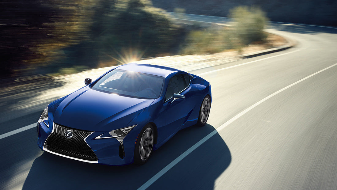 2024 Lexus LC 500h parked elegantly, showcasing its sleek design, modern interior, and advanced hybrid powertrain, symbolizing a new era in luxury grand touring.