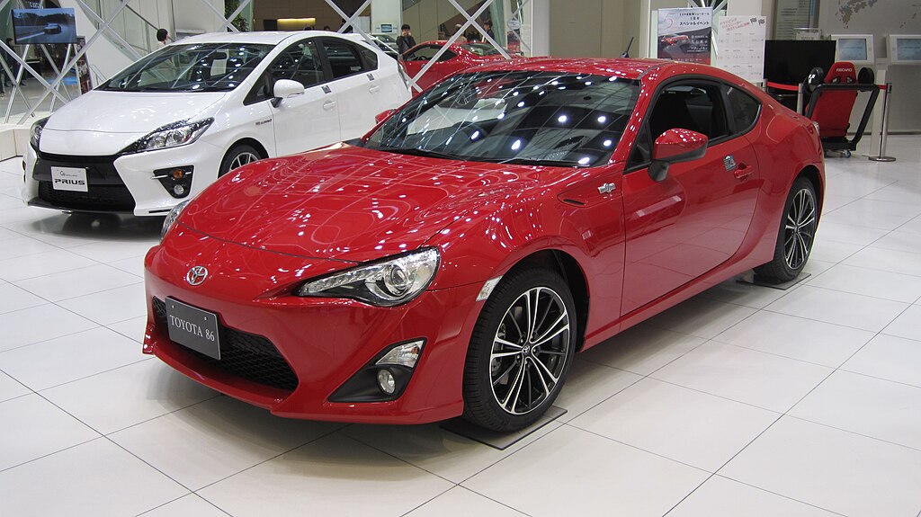 2024 Toyota GR86 in action, showcasing its sleek design and dynamic performance, perfect for enthusiasts seeking a pure driving experience.