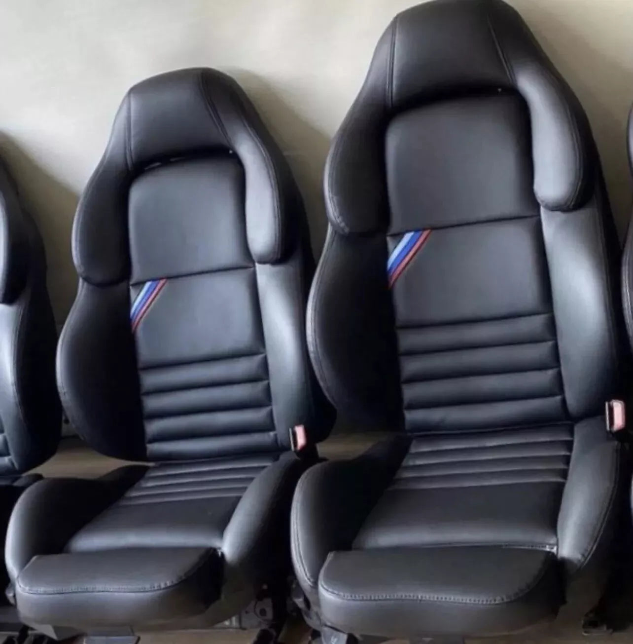 Black BMW E36 M3 Vader Seat Covers – OEM Replacement | Katzkin, Lseat.com, Ridies.com | Restore your E36 M3’s interior with premium black leather Vader seat covers, offering a perfect factory fit.