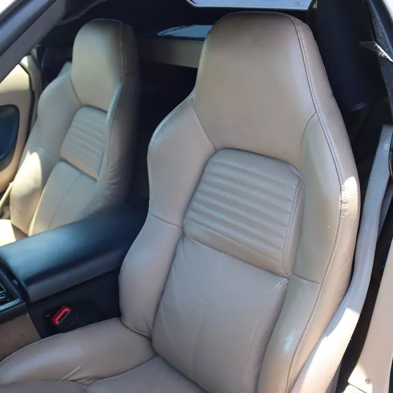 Corvette C4 OEM seat covers replacement in light beige leather – perfect blend of comfort and style. Compare with Kustom Interior, Lseat.com, Ridies.com, and West Coast Corvette.