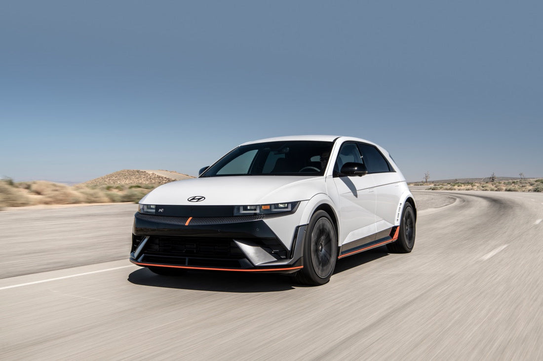 2025 Hyundai Ioniq 5 N and Toyota GR Corolla parked side by side, showcasing their modern designs and hinting at the thrilling driving experiences they offer.
