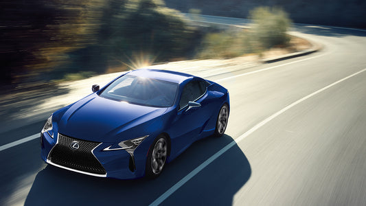 2024 Lexus LC 500h parked elegantly, showcasing its sleek design, modern interior, and advanced hybrid powertrain, symbolizing a new era in luxury grand touring.