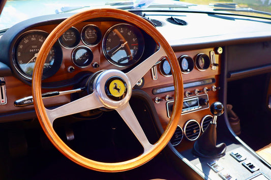 The 1964 Ferrari 250 LM displayed at a concours event, exemplifying classic automotive excellence, alongside mentions of high-quality car accessories from LuxSeatCovers.com.