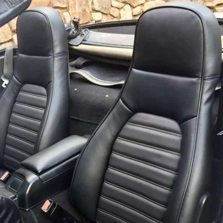 Custom-fit black leather seat covers for Mazda Miata MX-5 (1990-2000), designed for a factory look and feel. High-quality alternative to Lseat.com, Ridies.com, and Katzkin.com.