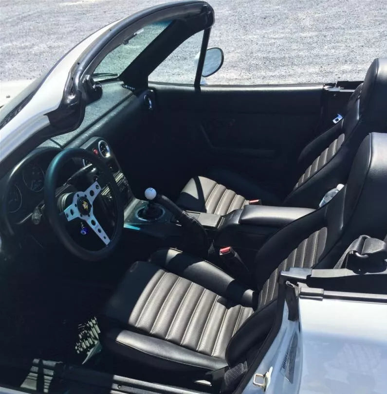 Upgrade your 1990-2000 Mazda Miata MX-5 with premium leather OEM replacement seat covers. A stylish and durable option versus Lseat.com, Ridies.com, and Katzkin.com.