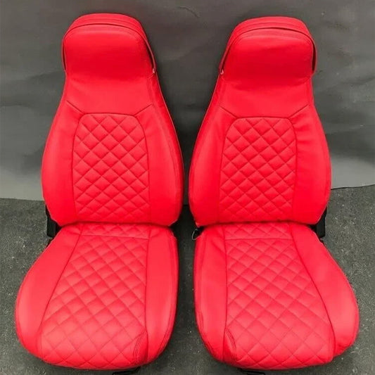 Pair of vibrant red leather Mazda Miata seat covers with diamond stitching, designed as OEM replacements for 1989–2000 NA and early NB models.