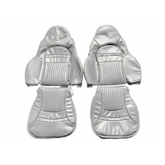 Set of custom gray faux leather car seat covers designed for Corvette C5. Features a pleated center and sleek design. Includes individual and paired seat covers, highlighting detailed stitching and high-quality materials for a stylish and durable interior upgrade.