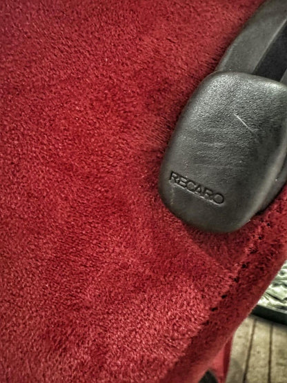 Close-up detail of the Recaro logo on the reclining lever of the SR3 Confetti DC2 Type R bucket seat, showing authenticity and brand quality.